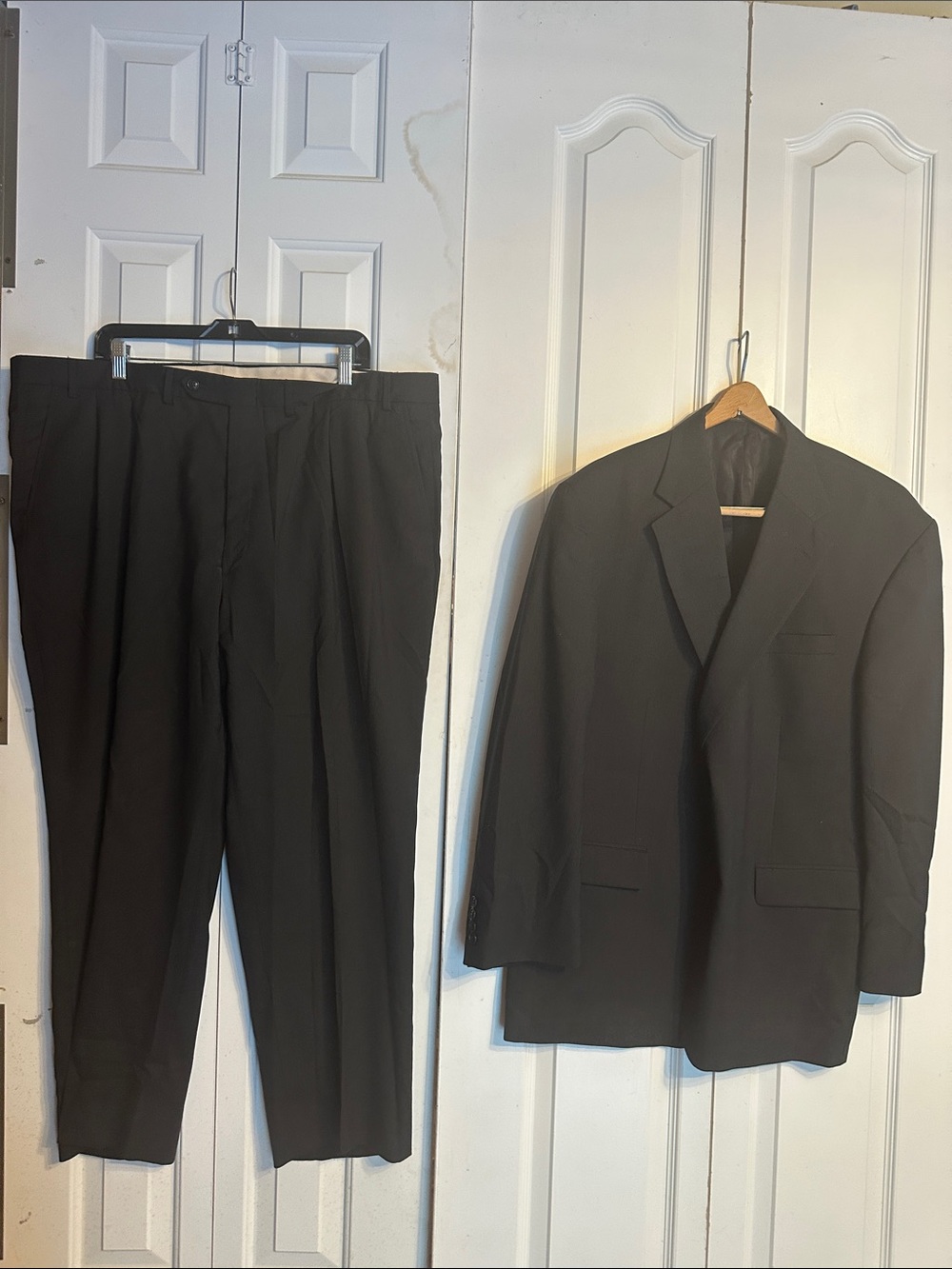 Men's Black Two-Piece Suit Jacket and Trousers